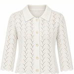An off-white open-knit cardigan featuring a pointed collar, three-quarter sleeves, and a scalloped hem, with cream buttons down the front.