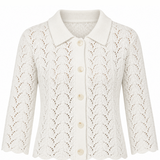 An off-white open-knit cardigan featuring a pointed collar, three-quarter sleeves, and a scalloped hem, with cream buttons down the front.