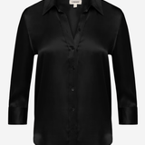 A black long-sleeve button-up shirt with a satin-like sheen, displayed on a clean white background.