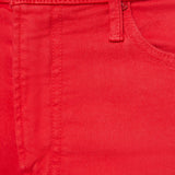 Close-up of a red fabric with a button and stitching details.