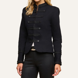 Women's black military-inspired jacket featuring long sleeves and a structured tailored silhouette.