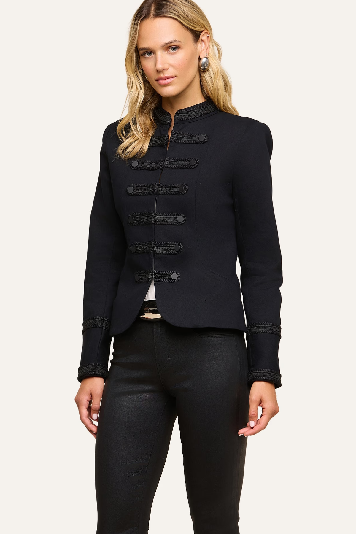 Women's black military-inspired jacket featuring long sleeves and a structured tailored silhouette.