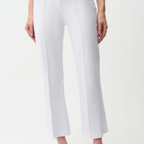 White pants worn by a person on a white background