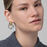 Statement gold knocker earrings with sculptural design