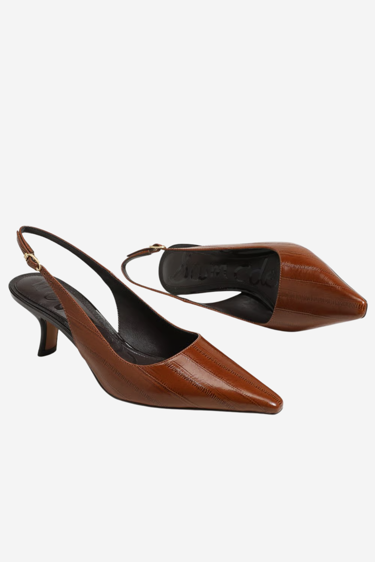 A pair of brown leather slingback pumps with pointed toes and kitten heels, displayed against a light gray background.