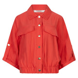 Red jacket with button details on a white background