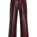 A pair of wide-leg trousers in a deep burgundy faux leather, shown from the back against a plain white background.