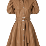 A tan faux-leather mini dress with puff sleeves, a button-down front, and a matching tie belt with a silver buckle, shown on a plain white background.