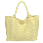 Yellow woven tote bag on a white background