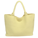 Yellow woven tote bag on a white background