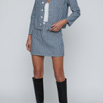 Cropped structured jacket in a blue tone.