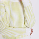 Lightweight knit stripe top with a relaxed, polished fit.