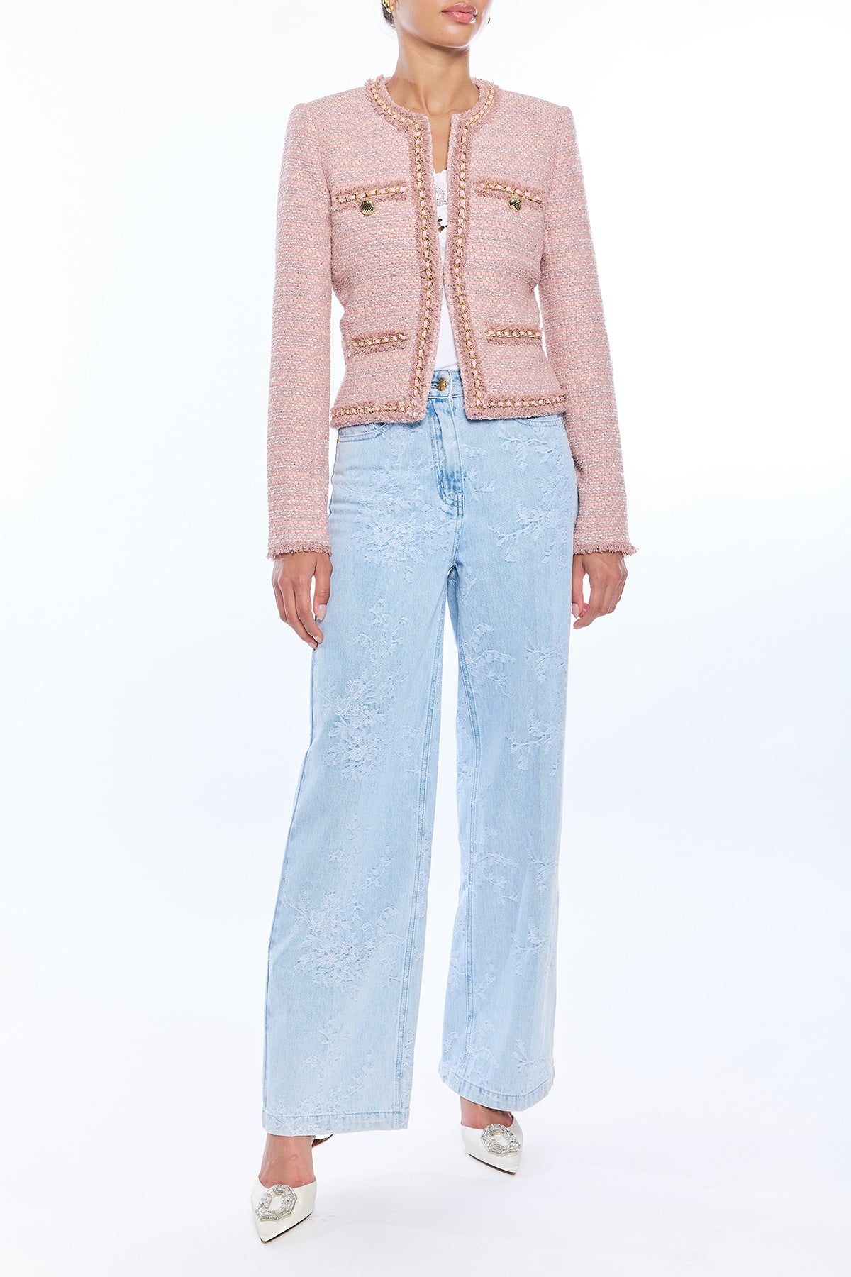woman in blush pink tweed jacket and wide leg denim 