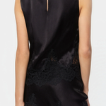 Black sleeveless top with lace detailing on a white background