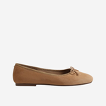 A single tan suede ballet flat shoe with a small matching fabric bow on the toe, shown in profile against a plain white background.