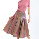 Pleated midi skirt with a soft, flowing silhouette and multicolor tones