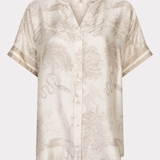 Beige patterned shirt on a white background