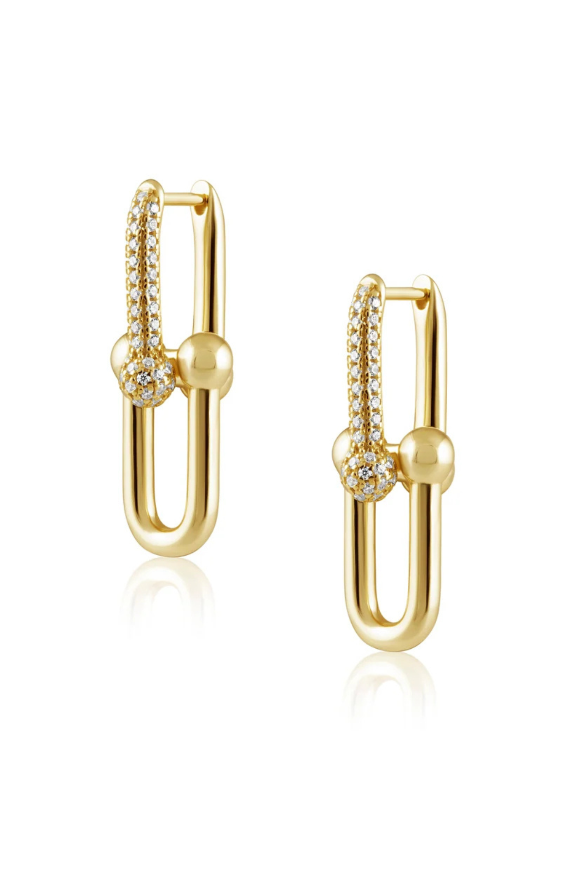A pair of gold huggie hoop earrings with pavé-set clear stones and polished gold bead accents, displayed on a clean white background with a soft reflection.
