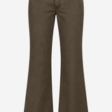 A pair of dark brown flared jeans with a faded wash, featuring classic five-pocket styling and a button closure, shown against a plain light gray background.