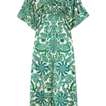 Green and white patterned dress on a white background