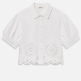 white eyelet shirt on white background 
