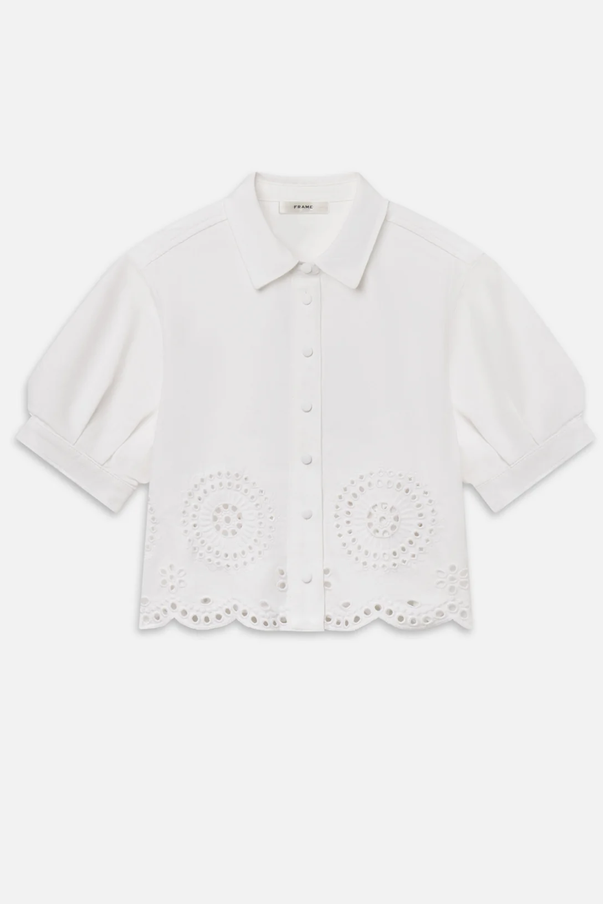 white eyelet shirt on white background 