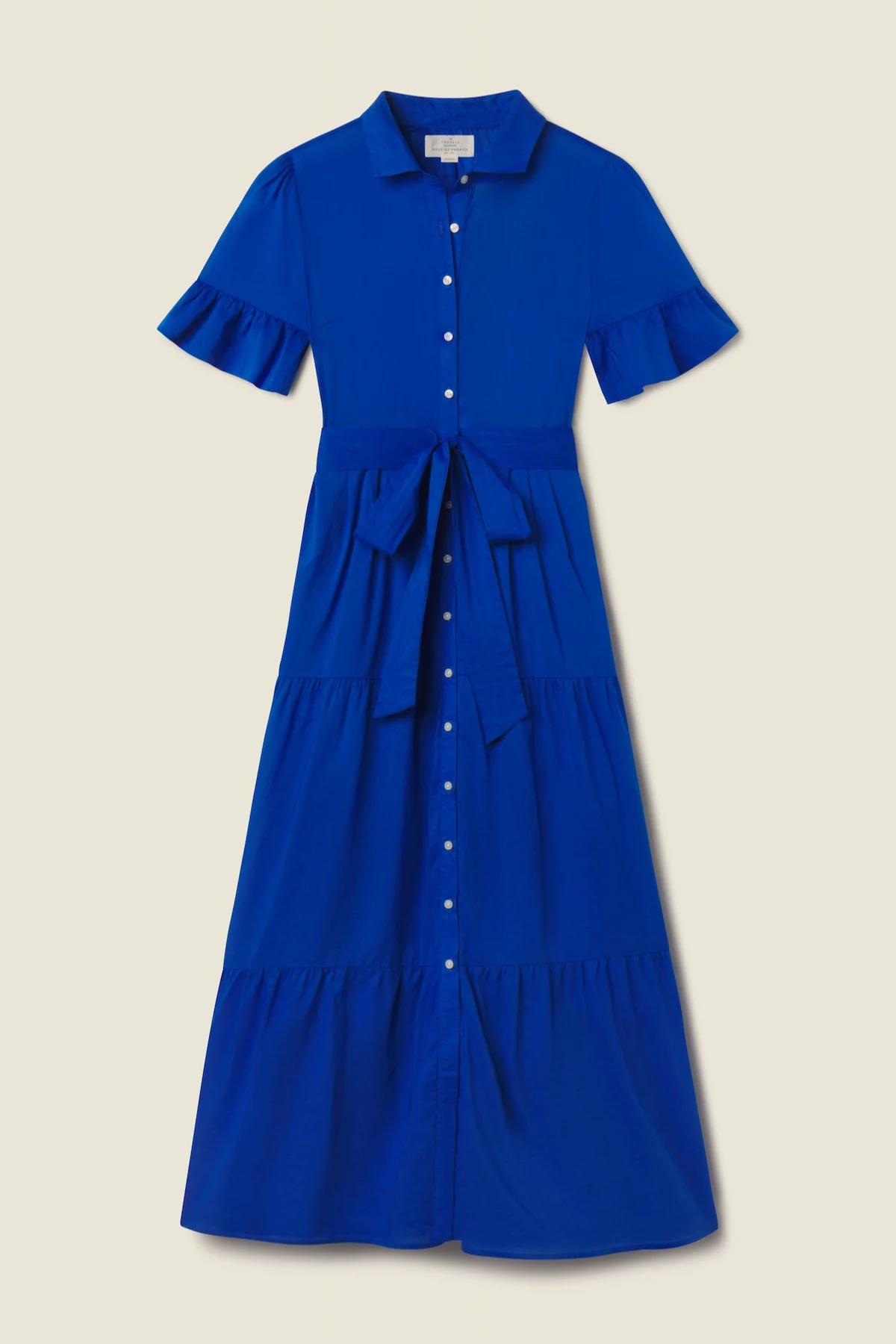 blue dress on tan background 