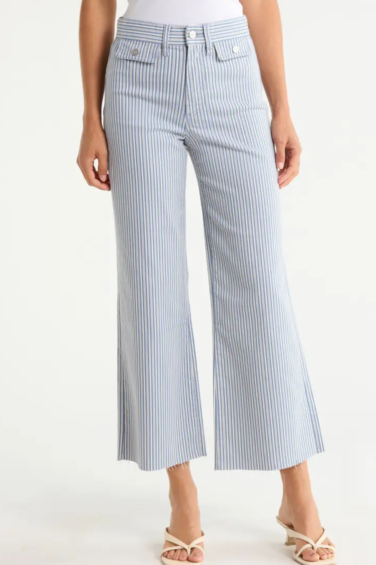 Blue and white striped wide-leg pants worn by a person on a white background