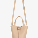 tan mini tote with crossbody strap on white background 