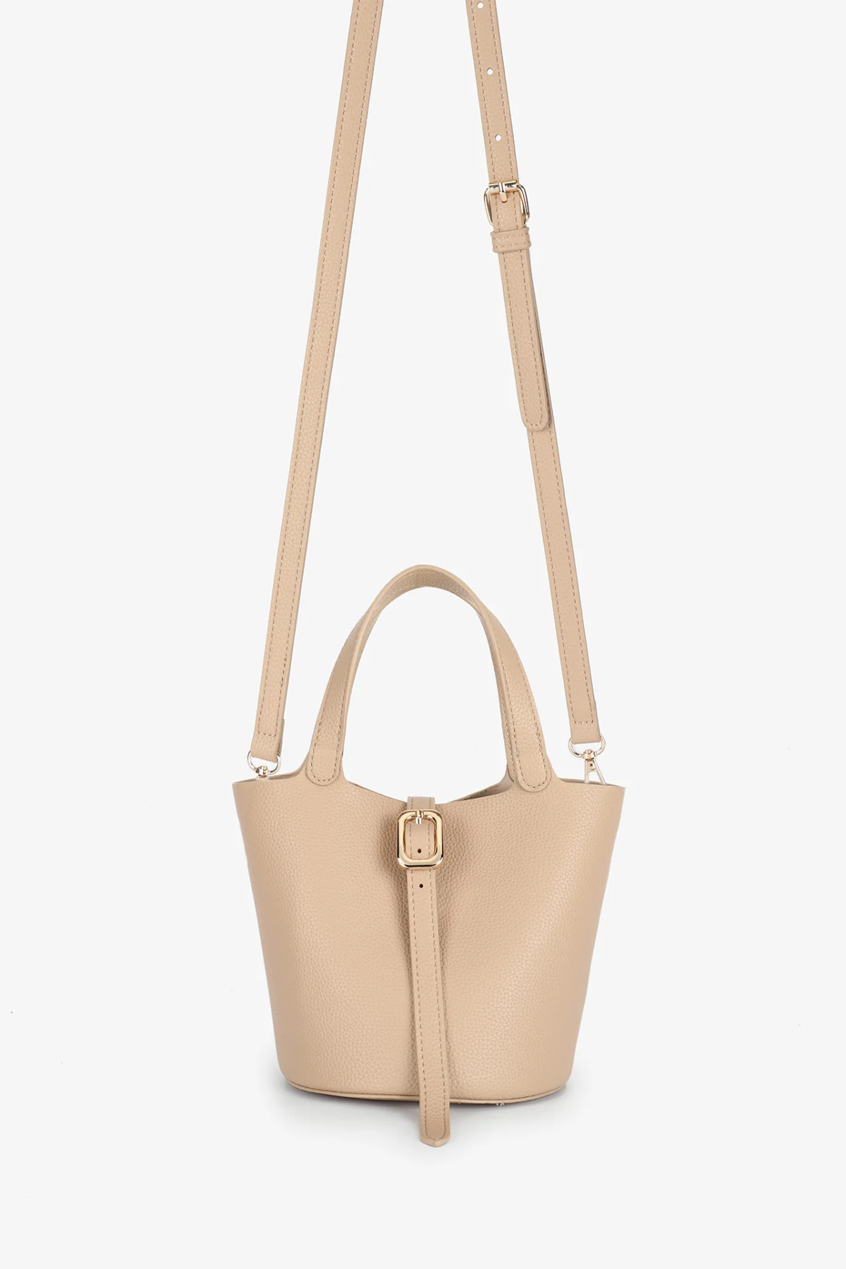 tan mini tote with crossbody strap on white background 