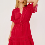 Woman wearing a red dress on a white background
