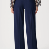 Model wearing navy scuba crepe pull-on wide-leg pants.