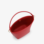 Red handbag with a handle on a white background