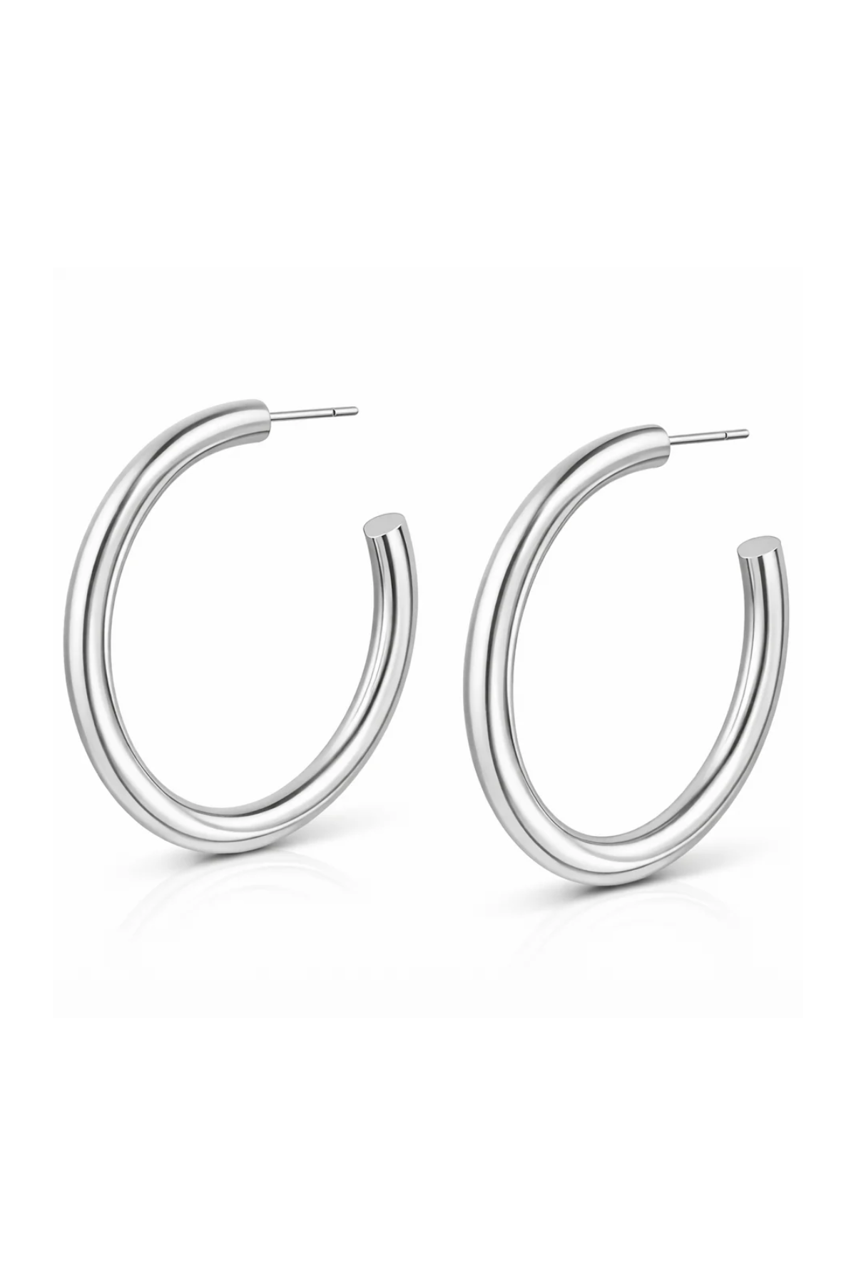 Pair of silver hoop earrings on a white background