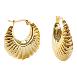 A pair of gold-toned textured hoop earrings with a ribbed, scalloped design, shown on a plain white background.