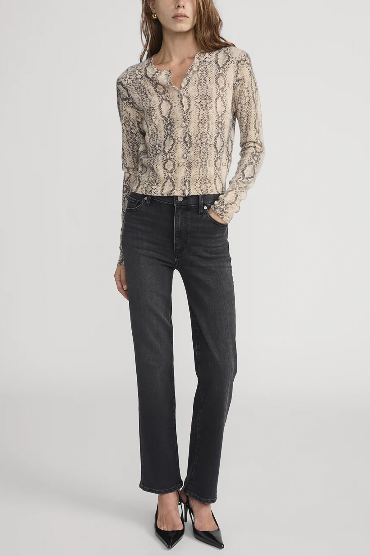Cashmere cardigan with subtle snake pattern, styled with dark denim