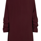 A dark burgundy longline blazer shown from the back, featuring a clean collar, long sleeves with gathered cuffs, and a straight silhouette, set against a plain white background.