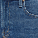 Close-up of blue denim jeans with a button and zipper detail.