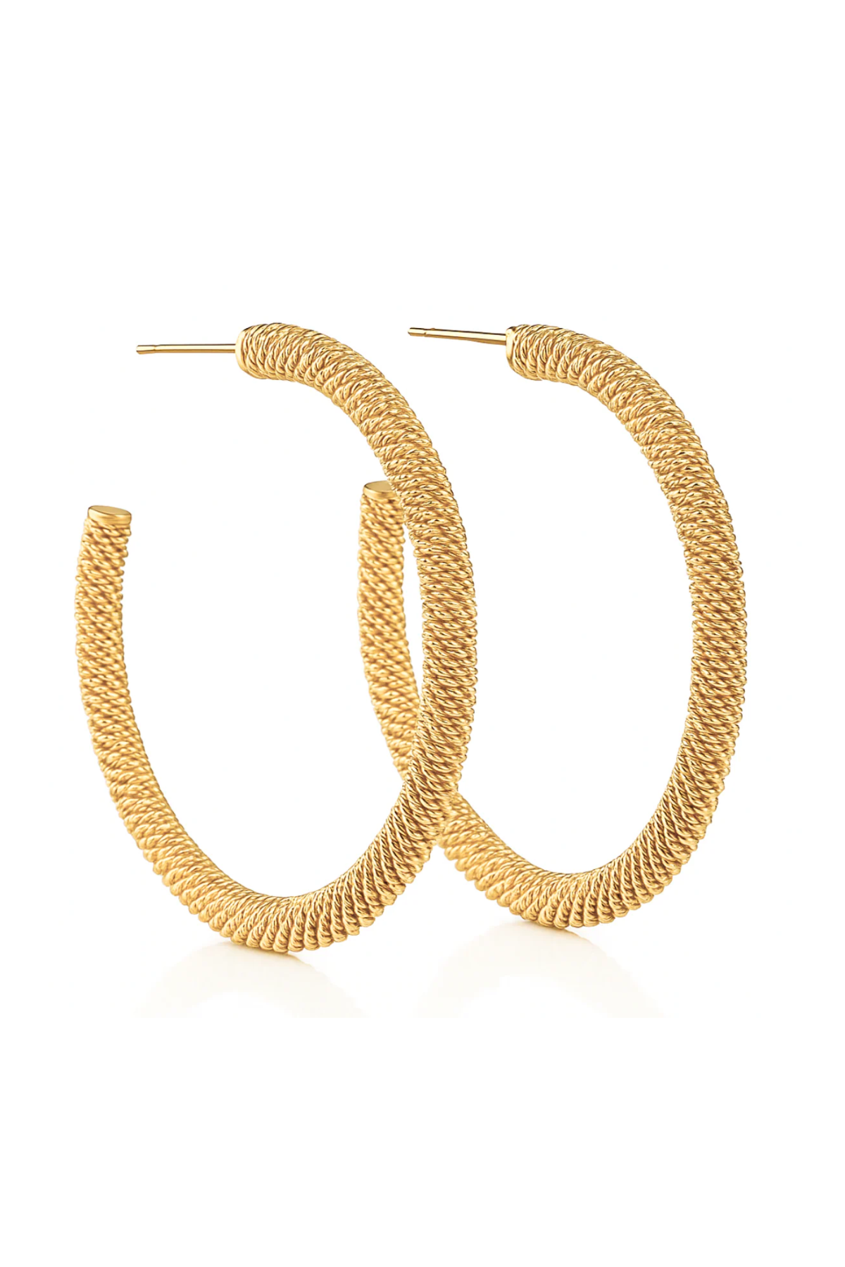 Gold hoop earrings on a white background
