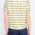 Striped top with subtle sequin detailing, styled for evening wear