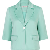 Mint green blazer on a white background