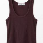 A sleeveless ribbed tank top in a deep plum-brown color, displayed flat against a clean white background. The brand name 'sophistication.