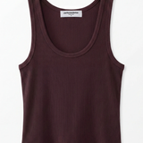 A sleeveless ribbed tank top in a deep plum-brown color, displayed flat against a clean white background. The brand name 'sophistication.