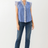 woman in jeans and stripe ruffle top