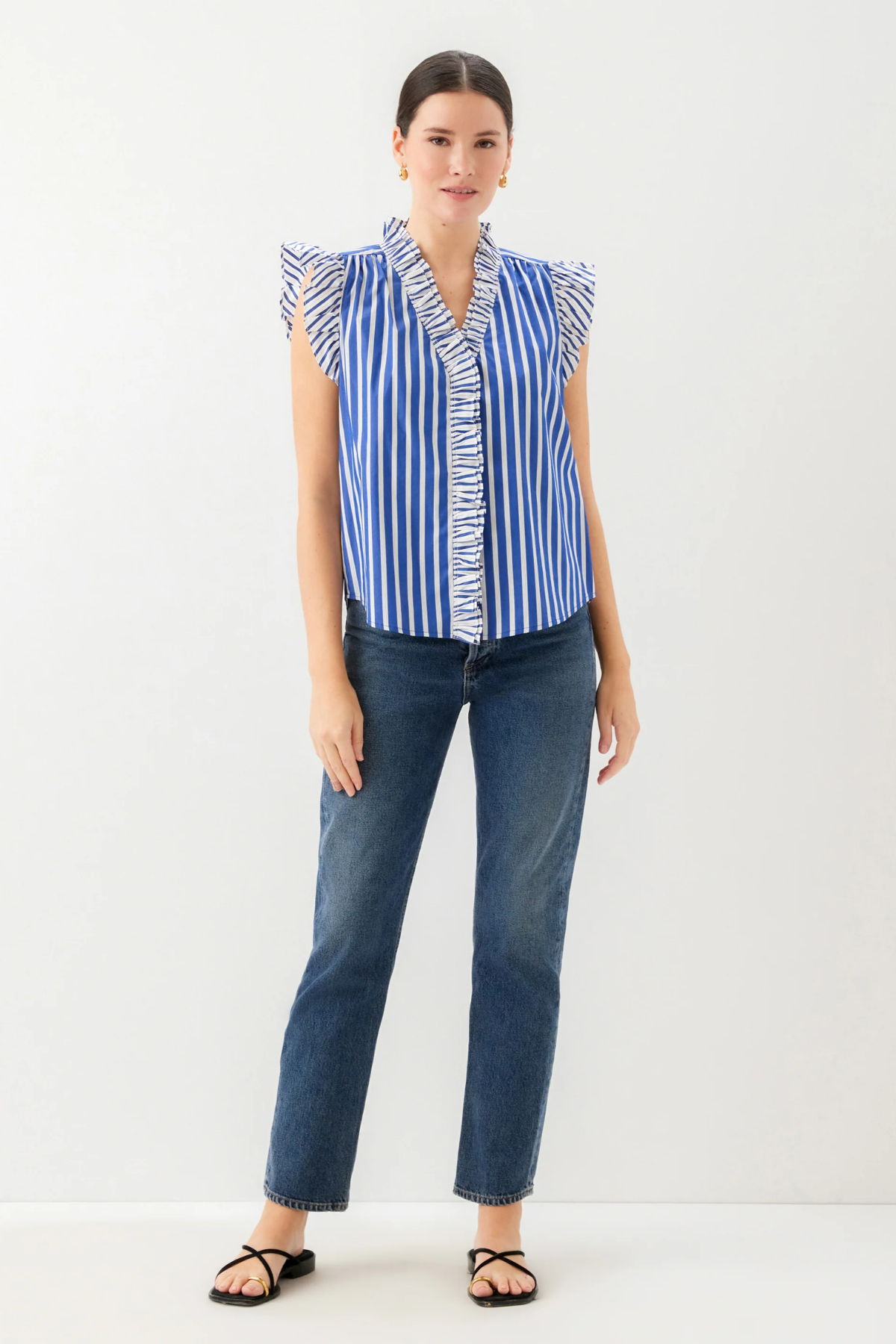 woman in jeans and stripe ruffle top