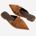 Women's flat shoe featuring a sleek, refined silhouette.