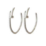 Pair of silver hoop earrings with small stones on a white background
