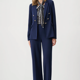 Model wearing navy scuba crepe pull-on wide-leg pants.