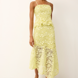 woman in yellow lace set on white background 