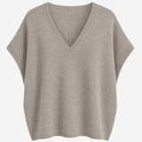 A light taupe knit sweater with a V-neck and short cape sleeves, shown against a plain white background.